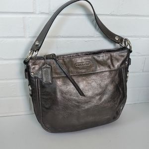 Coach Bronze color leather bag